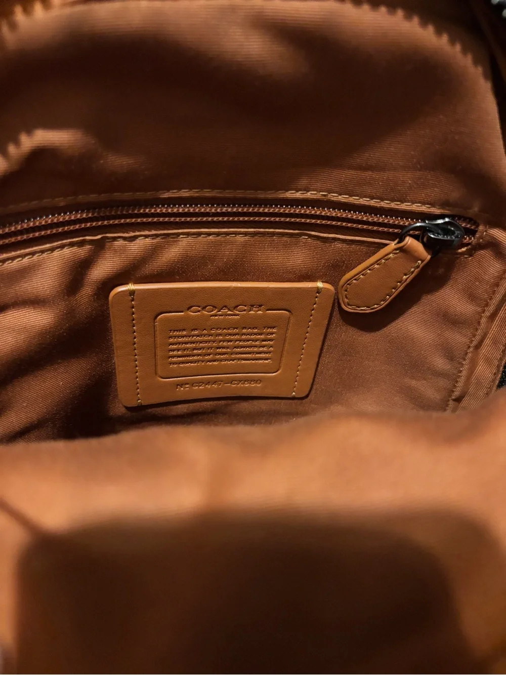 COACH Brown Signature Canvas Messenger Crossbody Bag with Black Leather Badge